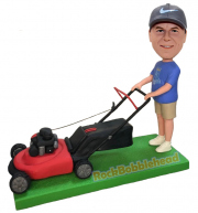 Man Cutting Glass with Lawn Mower Bobblehead