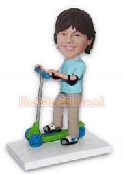 Boy with Elbow Pads Riding a Scooter Bobblehead